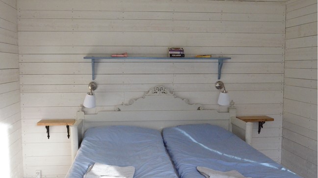 Ett av sovrummen i Muddus Bed & Breakfast.
